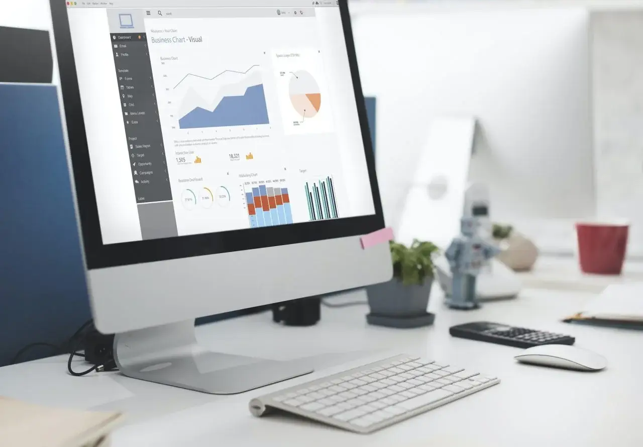 Computer displaying financial reports, charts and business performance data for accounting and advisory services in Sydney.
